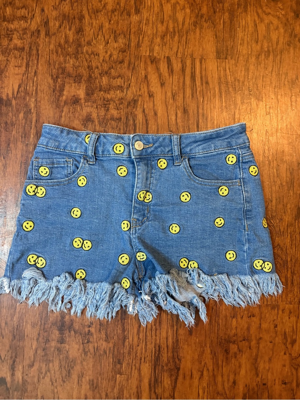 Altar'd State Blue Denim Cutoff Shorts with Yellow Smiley Dots
